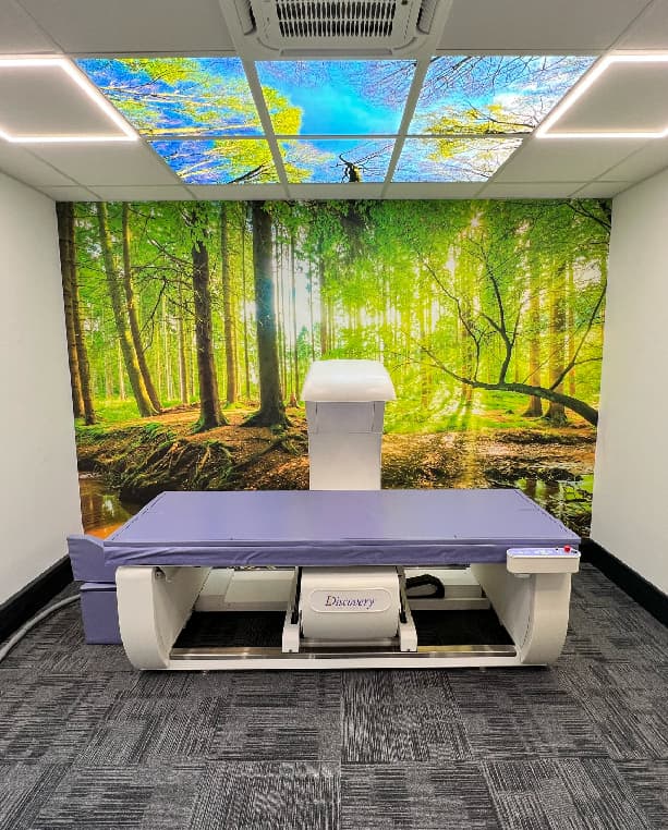 Our consultant Jenna demonstrating the dexa scanner