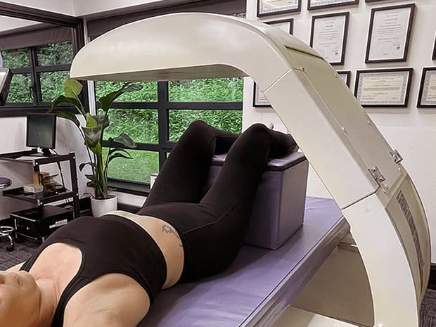 A customer having a hip scan on our DEXA scanner