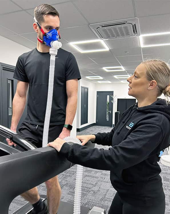 A customer standing ready for a vo2 max test